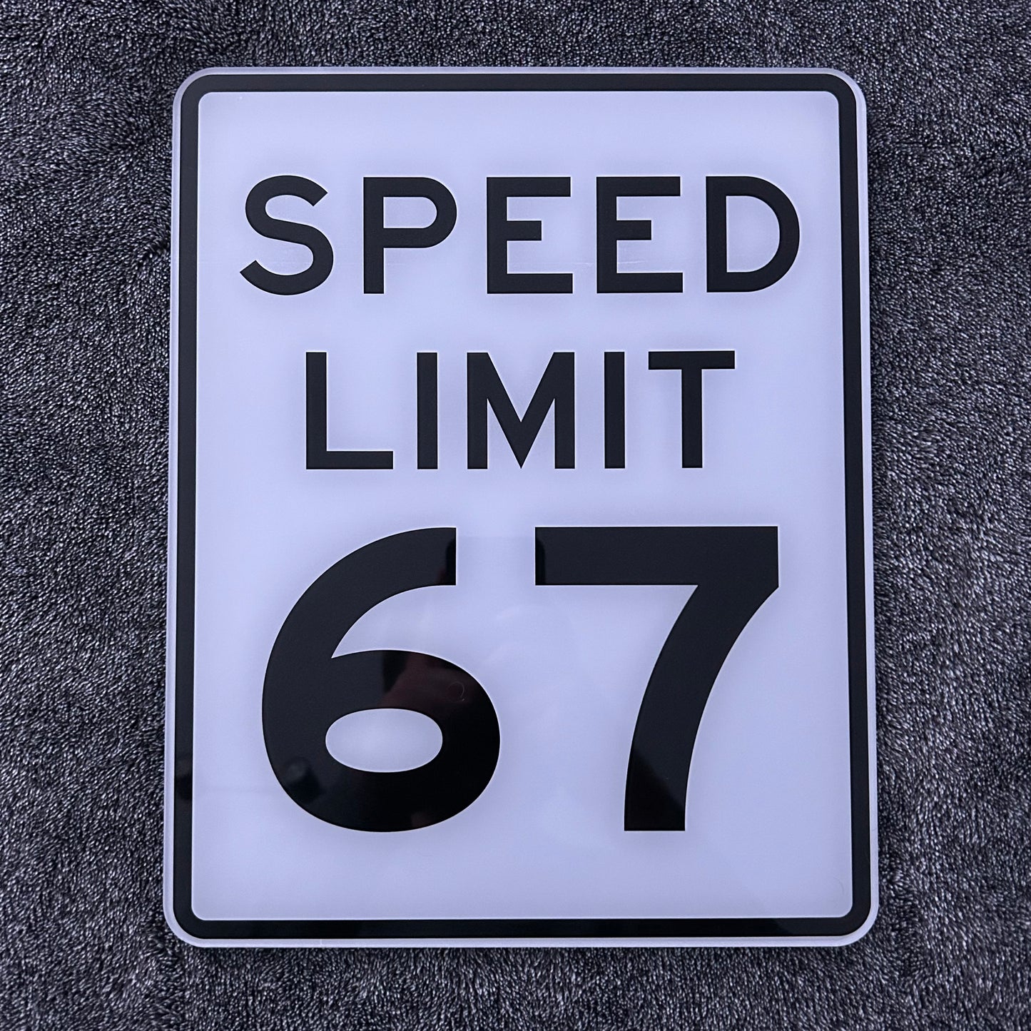 67 Speed Limit Sign
